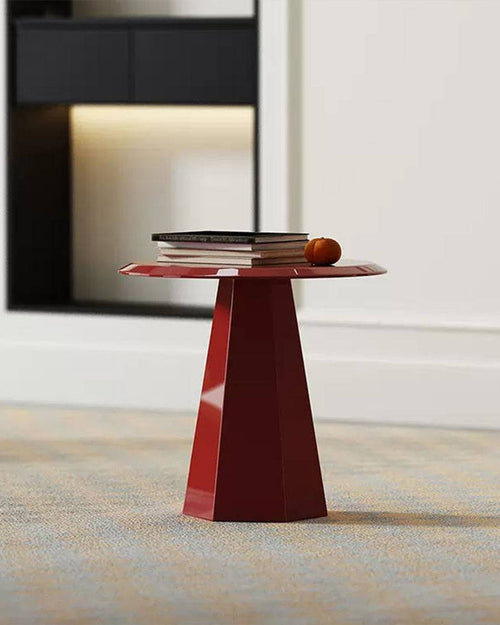 Red accent table in modern room