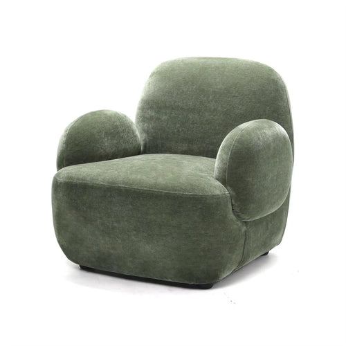 Dinkum chair with green plush and rounded form