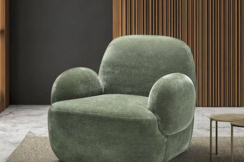 Plush Dinkum chair with sculpted arms