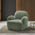 Plush Dinkum chair with sculpted arms