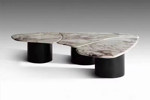 Shop the Dollard Luxury Coffee Table with a premium Calacatta marble top and sleek PU base. A designer marble coffee table perfect for modern luxury interiors.