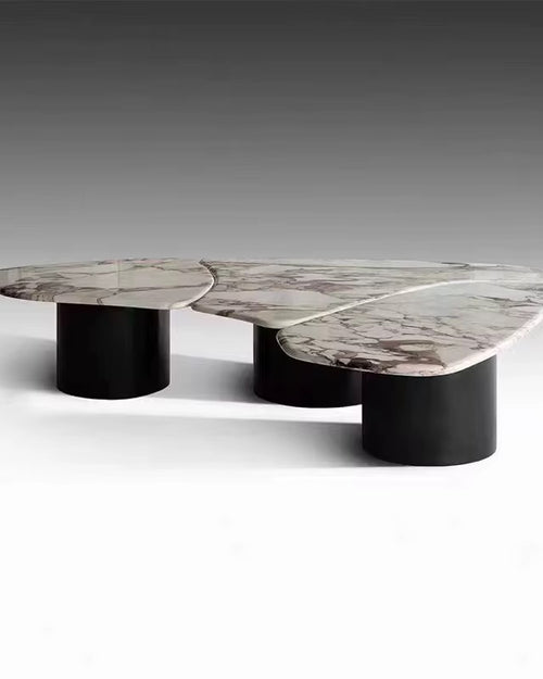 Shop the Dollard Luxury Coffee Table with a premium Calacatta marble top and sleek PU base. A designer marble coffee table perfect for modern luxury interiors.