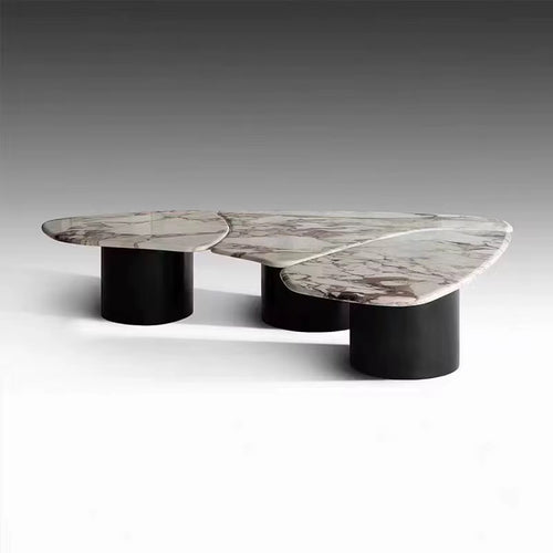 Shop the Dollard Luxury Coffee Table with a premium Calacatta marble top and sleek PU base. A designer marble coffee table perfect for modern luxury interiors.