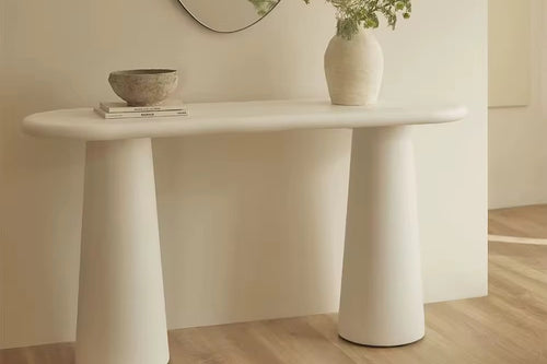Discover the Dome Foyer Console by Chair Collective — a modern minimal console with conical legs and PU finish, perfect for luxury entryways and calm interiors.