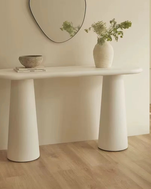 Discover the Dome Foyer Console by Chair Collective — a modern minimal console with conical legs and PU finish, perfect for luxury entryways and calm interiors.