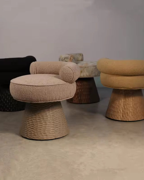 Discover the Donaire Swivel Luxury Chair, featuring bouclé upholstery and a sculpted wooden-effect base in white ash or teak look. A customisable luxury accent chair for premium interiors.