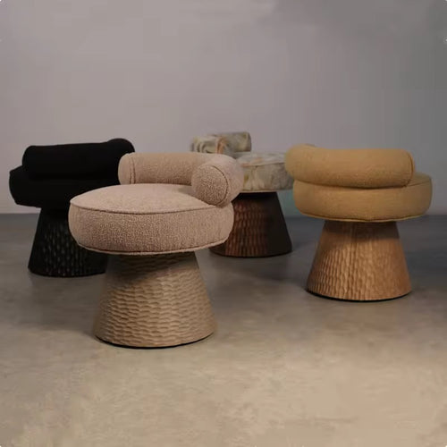 Discover the Donaire Swivel Luxury Chair, featuring bouclé upholstery and a sculpted wooden-effect base in white ash or teak look. A customisable luxury accent chair for premium interiors.