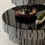 Round black glass coffee table top view 