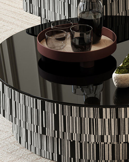 Round black glass coffee table top view 