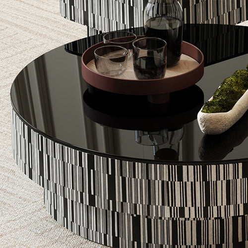 Round black glass coffee table top view 