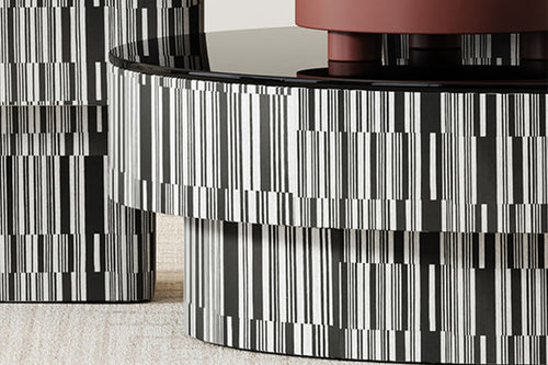 Close view of modern table with black and white patterned base 