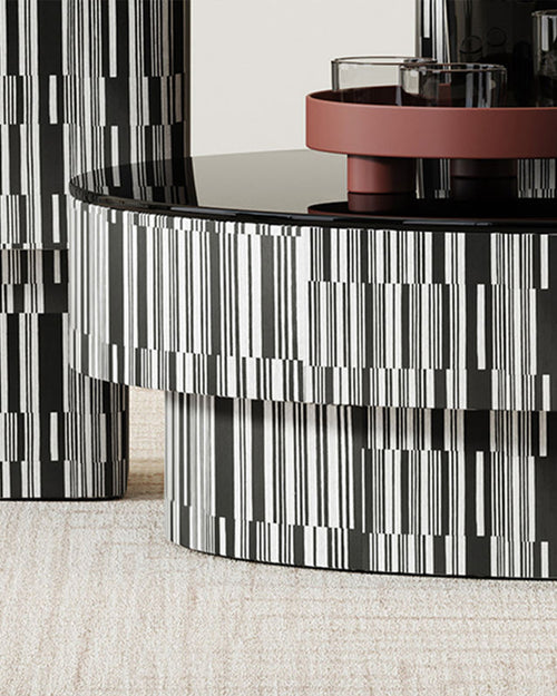Close view of modern table with black and white patterned base 