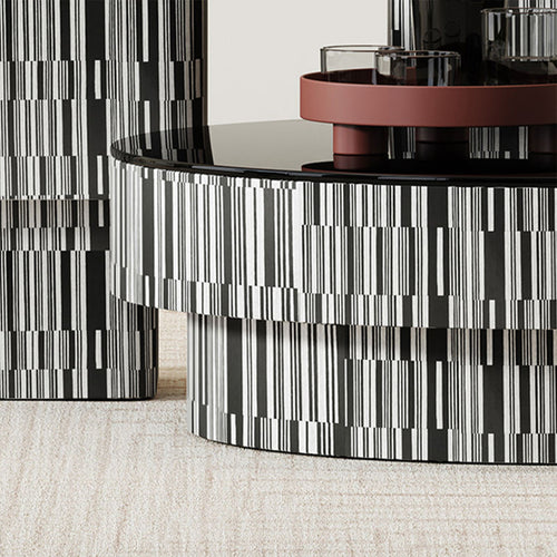 Close view of modern table with black and white patterned base 