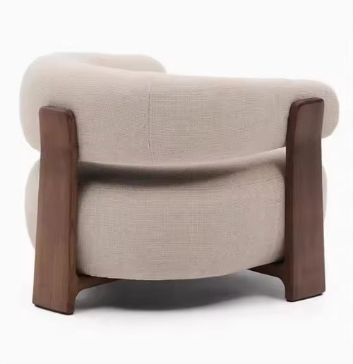 Beige armchair with wooden frame back profile
