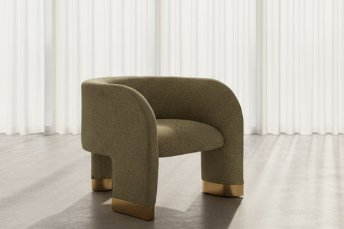 Shop the Erica Accent Chair by Chair Collective — a curved modern chair with golden accents and soft upholstery. Explore luxury accent chairs online in India.