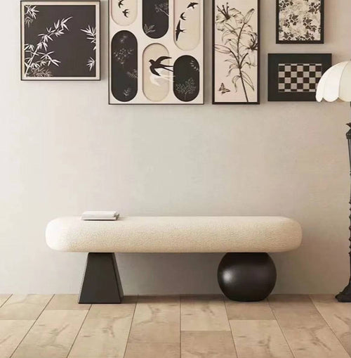 Everlyn Ottoman with asymmetrical base 