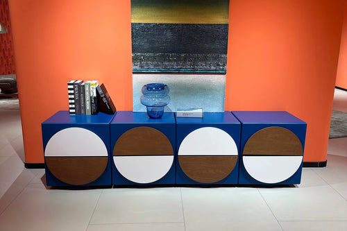 Farno Console by Chair Collective in a bold eclectic blue finish, featuring multiple storage drawers with playful contrasting circular details across the front.