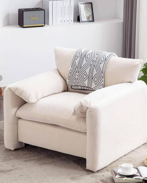 Side view of Fluffo chair, highlighting soft cushioning
