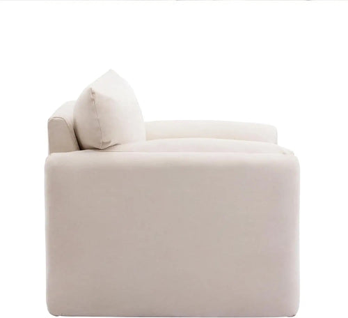 Side view of Fluffo cozy armchair