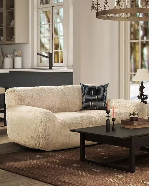 Furossa Couch is a luxury modern sofa with super soft cushioning and super furry upholstery. A cozy statement couch for premium living rooms and contemporary interiors.