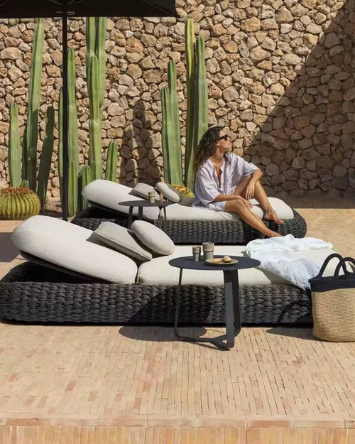 Side Profile of gray Gyro Outdoor Lounger