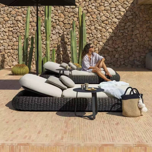 Side Profile of gray Gyro Outdoor Lounger