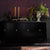 Bold black cabinet with gold pulls