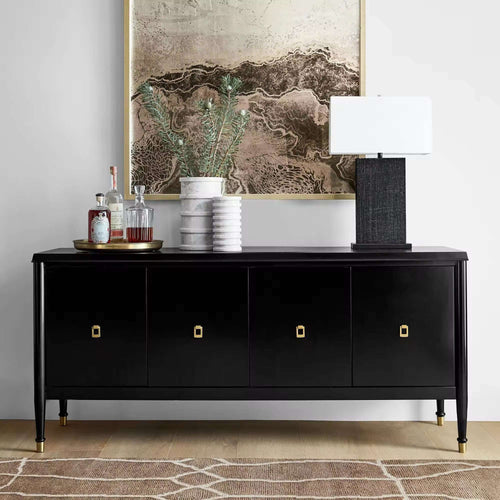 Black console with gold handles