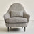 Front view of gray hario chair with matching pillow