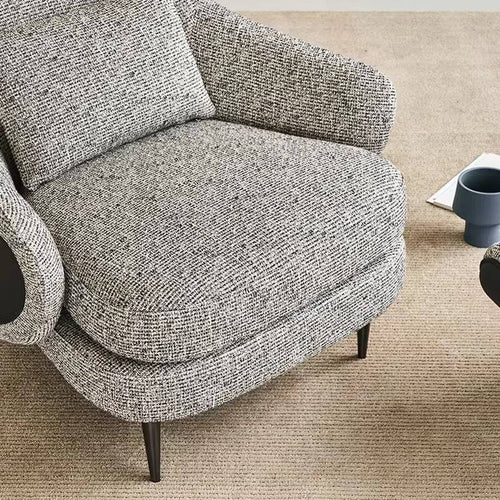 Close view of Hario chair with soft textured cushion
