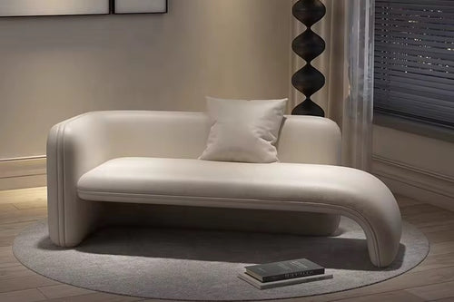 Haro Luxury Ottoman – 5.5ft modern curved lounge seating in leatherette or boucle. Customizable, comfortable, and available in multiple luxury colours. Luxury Ottoman Online by chair collective