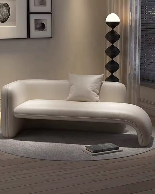 Haro Luxury Ottoman – 5.5ft modern curved lounge seating in leatherette or boucle. Customizable, comfortable, and available in multiple luxury colours. Luxury Ottoman Online by chair collective