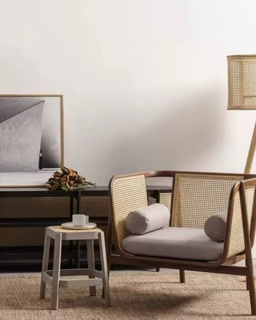 Haruka Couch is a luxury minimal sofa crafted in teak wood or ash wood with cane detailing. Available in black, teak, and natural finishes—perfect for modern, Japandi, and contemporary interiors.