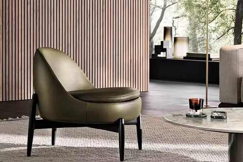 Modern olive green armchair in a stylish living room