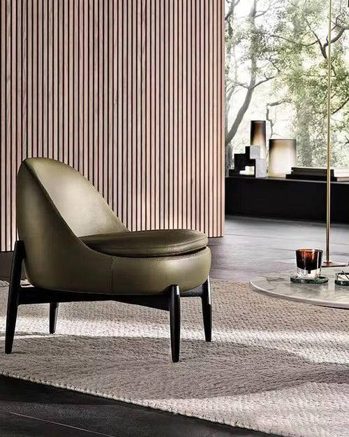 Modern olive green armchair in a stylish living room