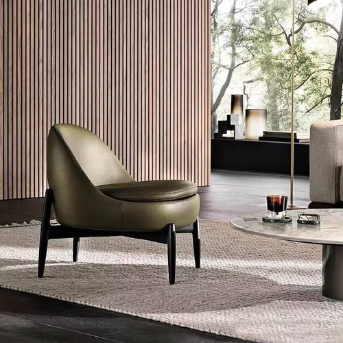 Modern olive green armchair in a stylish living room