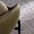 Close-up of the rich, smooth leatherette on the Hendrick chair.