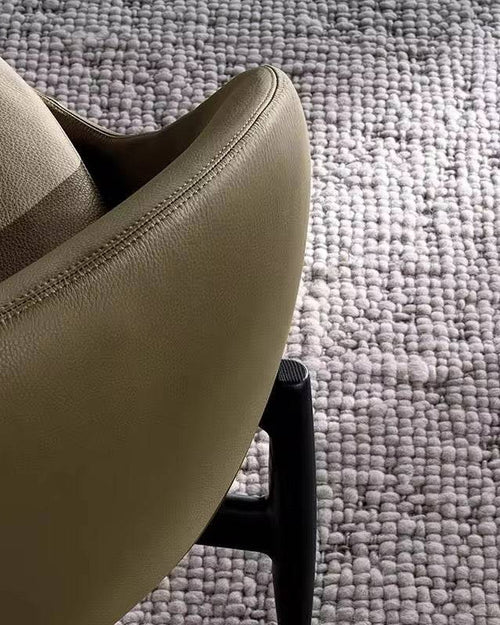 Close-up of the rich, smooth leatherette on the Hendrick chair.