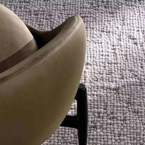 Close-up of the rich, smooth leatherette on the Hendrick chair.