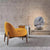 Vibrant mustard yellow Hendrick chair in a modern interior 