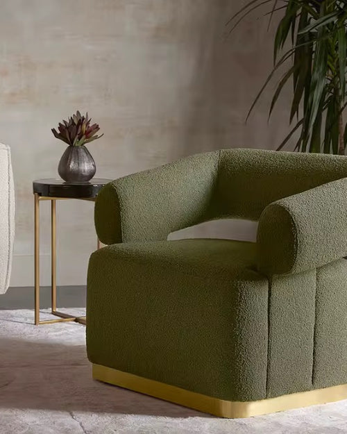 Shop the Henry Accent Chair by Chair Collective – a modern boucle chair with brass base, sculptural design, and customizable colours. Discover this luxury accent chair online in India, crafted for bold, contemporary interiors.