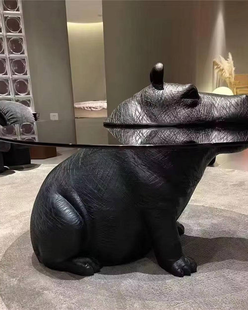 Side profile of coffee table with glass top.