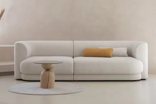 Herby Couch is a contemporary modern sofa with deep comfort and a clean curved silhouette, fully customisable in size, fabric, and configuration for luxury interiors.