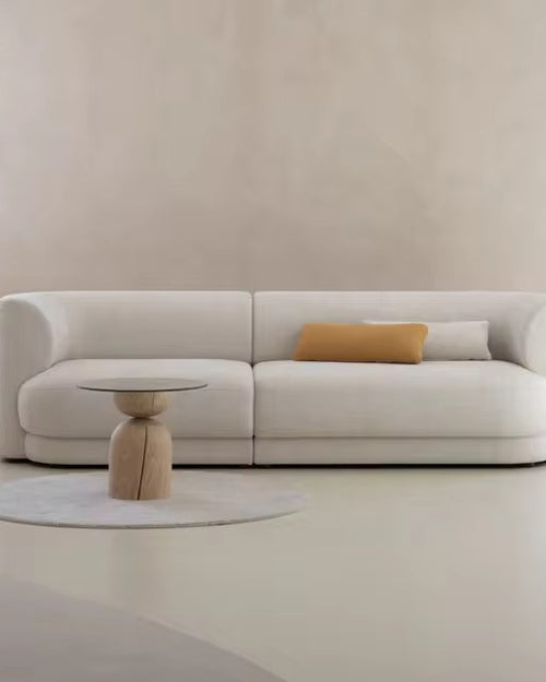Herby Couch is a contemporary modern sofa with deep comfort and a clean curved silhouette, fully customisable in size, fabric, and configuration for luxury interiors.