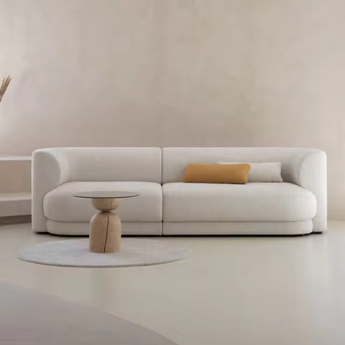 Herby Couch is a contemporary modern sofa with deep comfort and a clean curved silhouette, fully customisable in size, fabric, and configuration for luxury interiors.