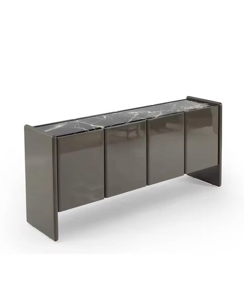 Hermosa Console's clean, linear form is elevated by reflective surfaces that play beautifully with light, while the marble top adds depth, texture, and timeless sophistication. Behind the seamless shuttered façade lies generous concealed storage, making the Hermosa Storage Console as practical as it is visually compelling.