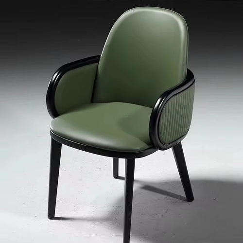 Hirdo dining chair in green with wooden legs.