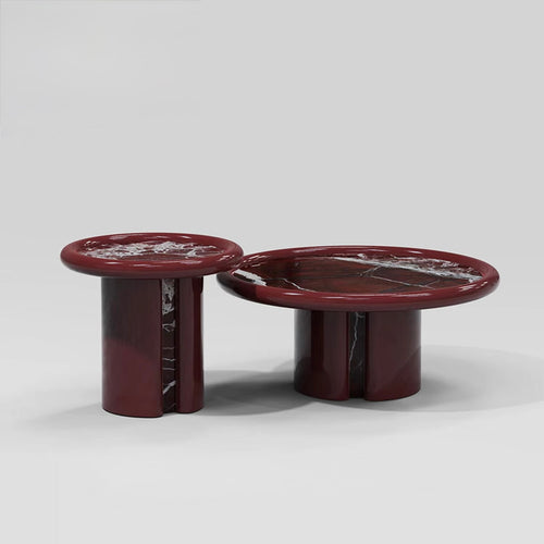 Hudson Cocktail Table featuring a sculptural cylindrical base, high-gloss red finish, and premium natural stone tabletop available in Rosso Levanto marble or White Travertine.