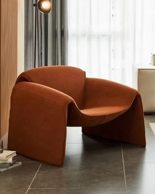 Hugo chair side view in living room 