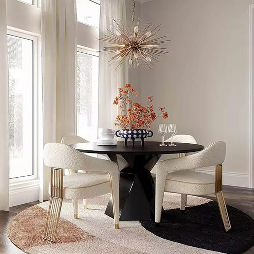 The Siena Chair is a statement in contemporary sophistication, designed to transform any dining or lounge setting into a scene of refined luxury. Upholstered in plush, creamy fabric, it offers a soft and inviting seat, perfectly balanced by its bold architectural base.
